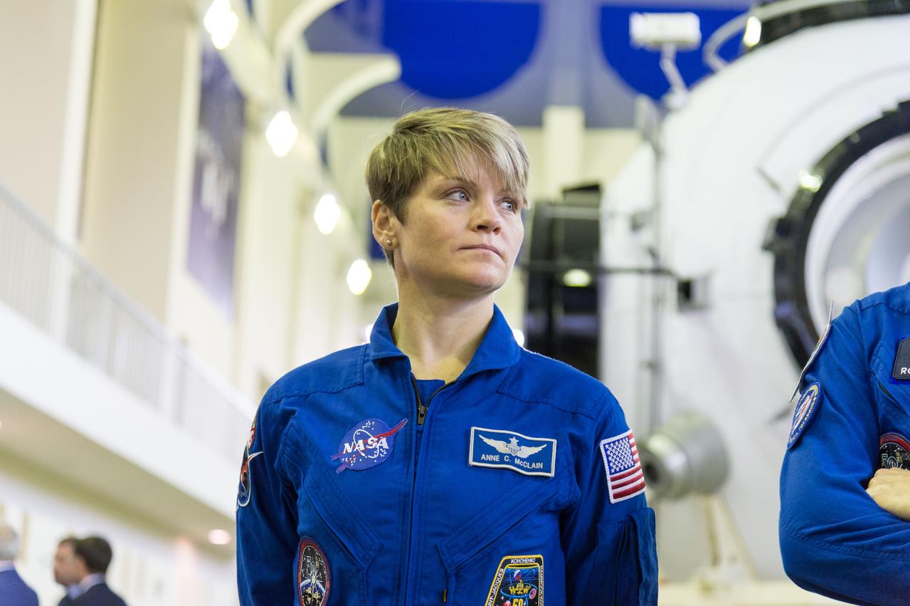 jsc2018e094964 - At the Gagarin Cosmonaut Training Center in Star City, Russia, Expedition 58 crewmember Anne McClain of NASA listens to a reporter’s question Nov. 13 during qualification exams. McClain, David Saint-Jacques of the Canadian Space Agency and Oleg Kononenko of Roscosmos will launch Dec. 3 on the Soyuz MS-11 spacecraft from the Baikonur Cosmodrome in Kazakhstan for a six-and-a-half month mission on the International Space Station...NASA/Sarah Volkman.