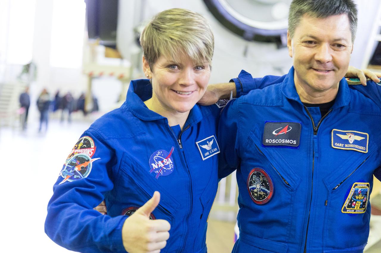 jsc2018e094966 - At the Gagarin Cosmonaut Training Center in Star City, Russia, Expedition 58 crewmembers Anne McClain of NASA (left), Oleg Kononenko of Roscosmos (right) pose for pictures Nov. 13 during final qualification exams. Along with David Saint-Jacques of the Canadian Space Agency (not pictured), they will launch Dec. 3 on the Soyuz MS-11 spacecraft from the Baikonur Cosmodrome in Kazakhstan for a six-and-a-half month mission on the International Space Station...NASA/Sarah Volkman.