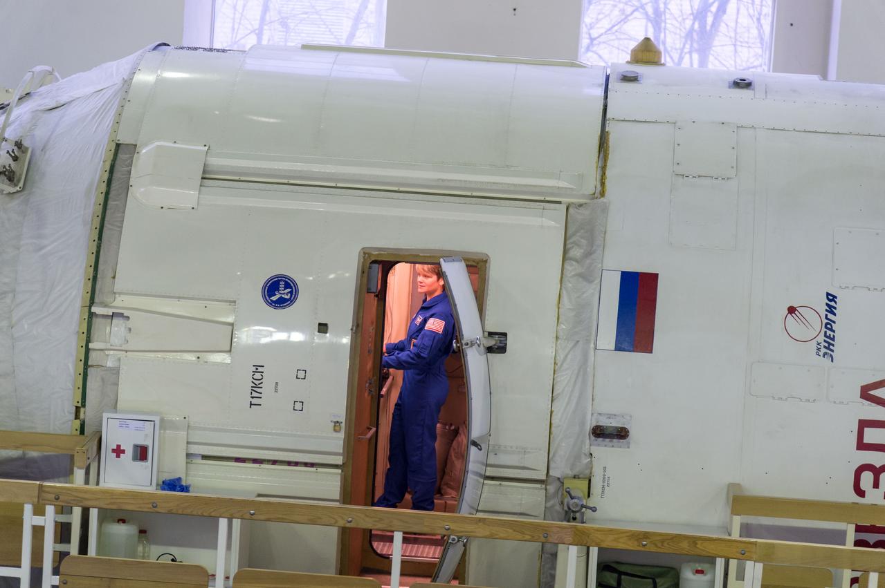 jsc2018e094967 - At the Gagarin Cosmonaut Training Center in Star City, Russia, Expedition 58 crewmember Anne McClain of NASA is seen in a Russian space station trainer Nov. 13 during final qualification exams. McClain, Oleg Kononenko of Roscosmos and David Saint-Jacques of the Canadian Space Agency will launch Dec. 3 on the Soyuz MS-11 spacecraft from the Baikonur Cosmodrome in Kazakhstan for a six-and-a-half month mission on the International Space Station...NASA/Sarah Volkman.