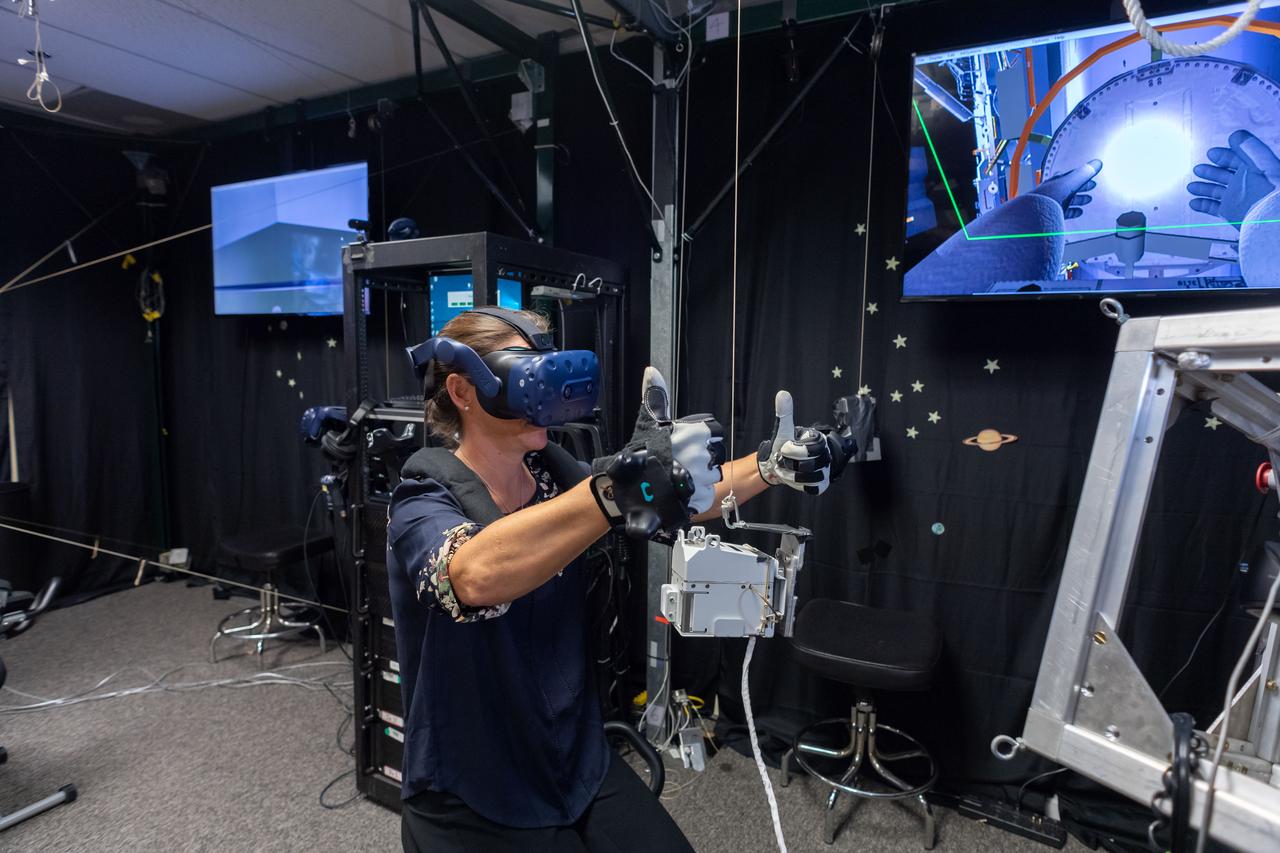 Commercial Crew Program astronaut and Boeing Crew Flight Test crew member Nicole Mann in SAFER Skills training in VR Lab.