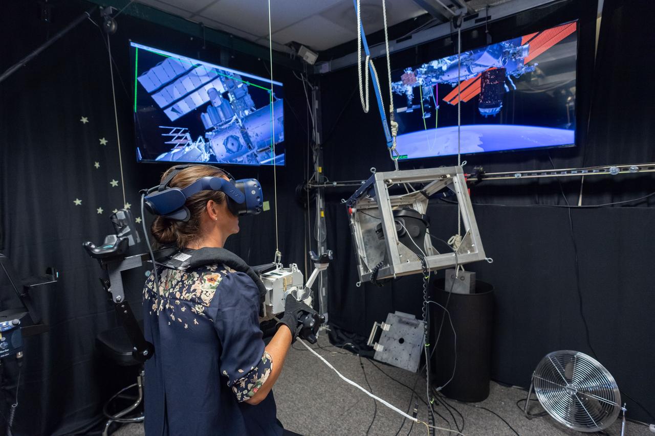 Commercial Crew Program astronaut and Boeing Crew Flight Test crew member Nicole Mann in SAFER Skills training in VR Lab.