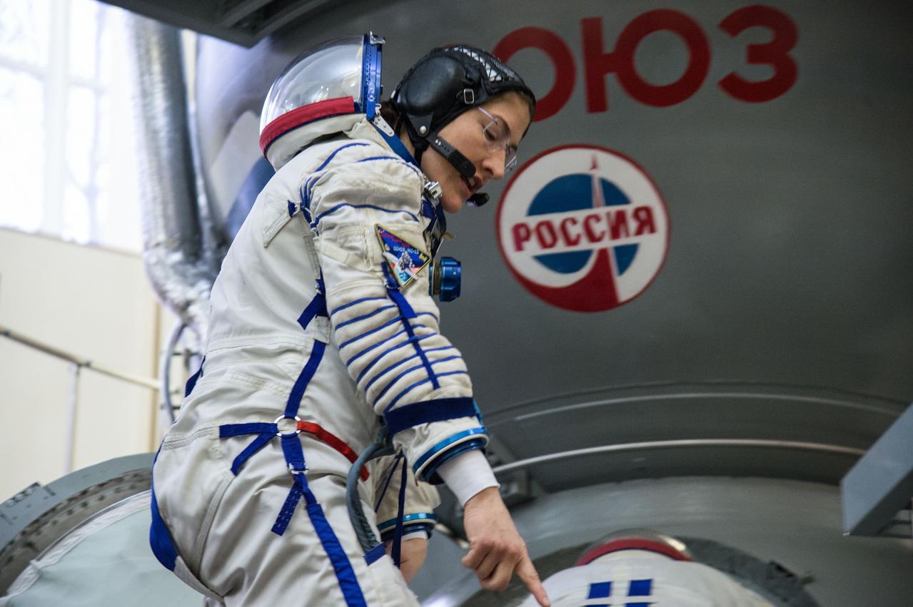 jsc2019e004057 (Feb. 20, 2019) --- At the Gagarin Cosmonaut Training Center in Star City, Russia, Expedition 59 crew member Christina Koch of NASA boards a Soyuz spacecraft simulator Feb. 20 during the second day of final pre-launch qualifications exams. Koch, Nick Hague of NASA and Alexey Ovchinin of Roscosmos will launch March 14, U.S. time, in the Soyuz MS-12 spacecraft from the Baikonur Cosmodrome in Kazakhstan for a six-and-a-half month mission on the International Space Station. Credit: NASA/Beth Weissinger