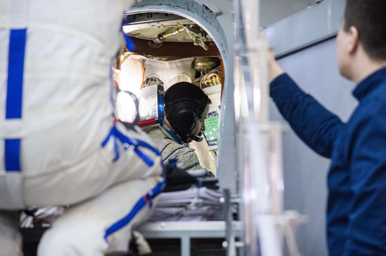 jsc2019e004059 (Feb. 20, 2019) --- At the Gagarin Cosmonaut Training Center in Star City, Russia, Expedition 59 crew member Nick Hague of NASA is seen inside a Soyuz spacecraft simulator Feb. 20 during the second day of final pre-launch qualification exams. Hague, Christina Koch of NASA and Alexey Ovchinin of Roscosmos will launch March 14, U.S. time, in the Soyuz MS-12 spacecraft from the Baikonur Cosmodrome in Kazakhstan for a six-and-a-half month mission on the International Space Station. Credit: NASA/Beth Weissinger