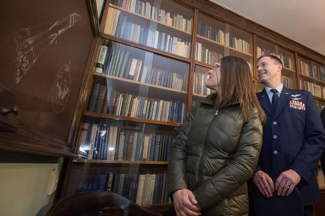NASA image: jsc2019e004429 - At the Korolev Library in Moscow named after the Russian space designer, Sergei Korolev, NASAâ€™s Expedition 59 astronauts Christina Koch (left) and Nick Hague (right) study a framed drawing of a Soyuz rocket Feb. 21 that Korolev himself 
