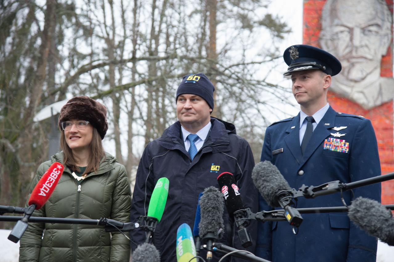 At the Gagarin Cosmonaut Training Center in Star City, Russia, Expedition 59 crewmembers Christina Koch of NASA (left), Alexey Ovchinin of Roscosmos (center) and Nick Hague of NASA (right) listen to reporters’ questions Feb. 26 as they prepared to depart for their launch site at the Baikonur Cosmodrome in Kazakhstan for final pre-launch training. They will launch on March 14, U.S. time, on the Soyuz MS-12 spacecraft from the Baikonur Cosmodrome in Kazakhstan for a six-and-a-half month mission on the International Space Station.  NASA/Beth Weissinger 