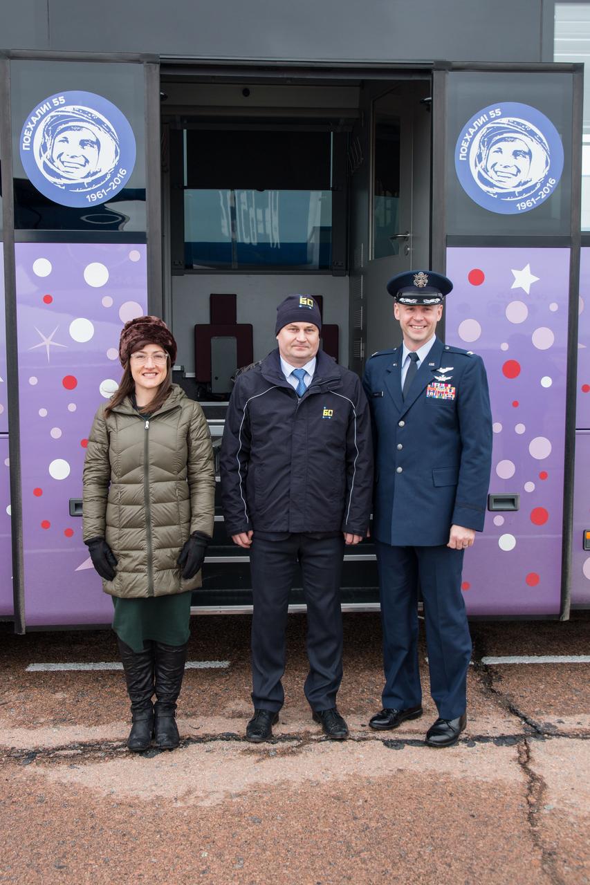 Expedition 59 crewmembers Christina Koch of NASA (left), Alexey Ovchinin of Roscosmos (center) and Nick Hague of NASA (right) pose for pictures Feb. 26 after arriving at the Baikonur Cosmodrome in Kazakhstan for final pre-launch training following a flight from their training base at the Gagarin Cosmonaut Training Center in Star City, Russia. They will launch March 14, U.S. time, on the Soyuz MS-12 spacecraft from the Baikonur Cosmodrome in Kazakhstan for a six-and-a-half month mission on the International Space Station.  NASA/Victor Zelentsov 