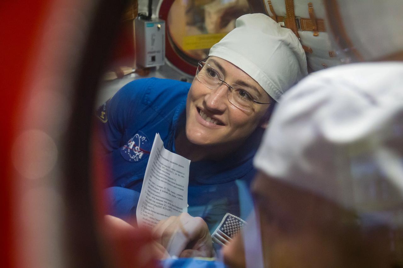 At the Baikonur Cosmodrome in Kazakhstan, Expedition 59 crewmember Christina Koch of NASA works inside the Soyuz MS-12 spacecraft Feb. 27 during pre-launch training. Koch, Alexey Ovchinin of Roscosmos and Nick Hague of NASA (right) will launch March 14, U.S. time, on the Soyuz MS-12 spacecraft from the Baikonur Cosmodrome in Kazakhstan for a six-and-a-half month mission on the International Space Station. NASA/Victor Zelentsov