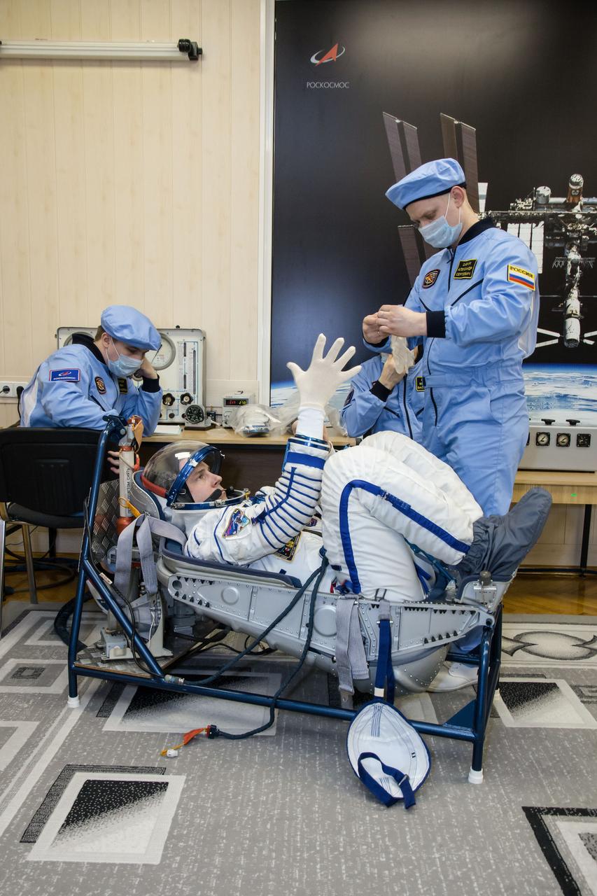 At the Baikonur Cosmodrome in Kazakhstan, Expedition 59 crewmember Nick Hague of NASA undergoes a Sokol launch suit pressure check Feb. 27 during pre-launch training. Hague, Christina Koch of NASA and Alexey Ovchinin of Roscosmos will launch March 14, U.S. time, on the Soyuz MS-12 spacecraft from the Baikonur Cosmodrome in Kazakhstan for a six-and-a-half month mission on the International Space Station. NASA/Victor Zelentsov