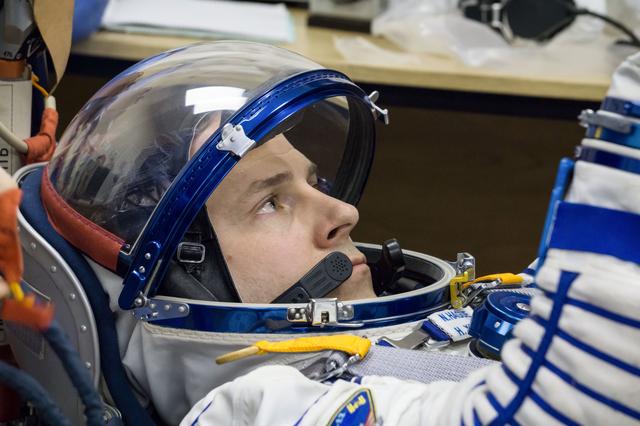 NASA image: jsc2019e009951 - At the Baikonur Cosmodrome in Kazakhstan, Expedition 59 crewmember Nick Hague of NASA undergoes a Sokol launch suit pressure check Feb. 27 during pre-launch training. Hague, Christina Koch of NASA and Alexey Ovchinin of Roscosmos will lau