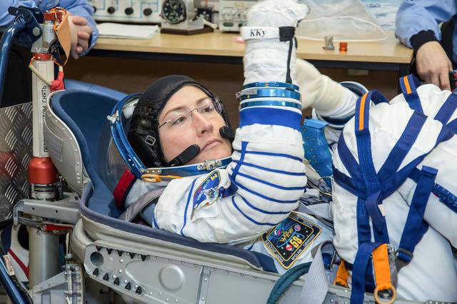 NASA image: jsc2019e009953 - At the Baikonur Cosmodrome in Kazakhstan, Expedition 59 crewmember Christina Koch of NASA undergoes a Sokol launch suit pressure check Feb. 27 during pre-launch training. Koch, Nick Hague of NASA and Alexey Ovchinin of Roscosmos will laun