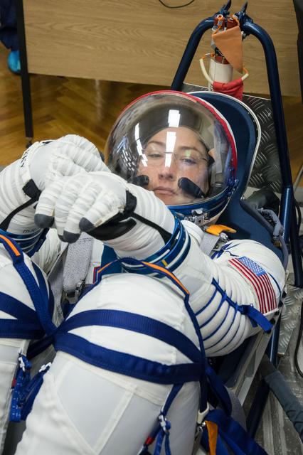 NASA image: jsc2019e009954 - At the Baikonur Cosmodrome in Kazakhstan, Expedition 59 crewmember Christina Koch of NASA undergoes a Sokol launch suit pressure check Feb. 27 during pre-launch training. Koch, Nick Hague of NASA and Alexey Ovchinin of Roscosmos will laun