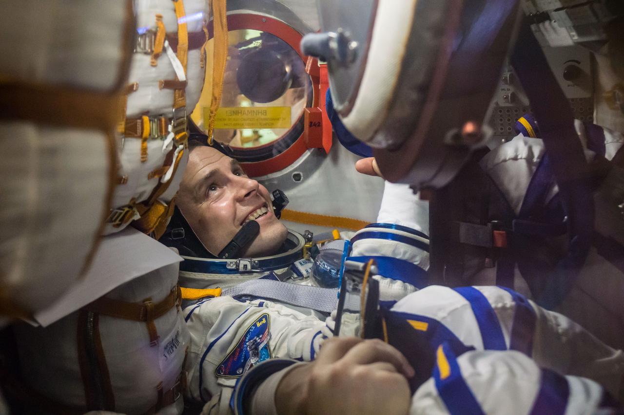 At the Baikonur Cosmodrome in Kazakhstan, Expedition 59 crewmember Nick Hague of NASA works inside the Soyuz MS-12 spacecraft Feb. 27 during pre-launch training. Hague, Christina Koch of NASA and Alexey Ovchinin of Roscosmos will launch March 14, U.S. time, on the Soyuz MS-12 spacecraft from the Baikonur Cosmodrome in Kazakhstan for a six-and-a-half month mission on the International Space Station. NASA/Victor Zelentsov