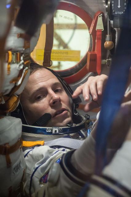 NASA image: jsc2019e009958 - At the Baikonur Cosmodrome in Kazakhstan, Expedition 59 crewmember Nick Hague of NASA works inside the Soyuz MS-12 spacecraft Feb. 27 during pre-launch training. Hague, Christina Koch of NASA and Alexey Ovchinin of Roscosmos will launch M