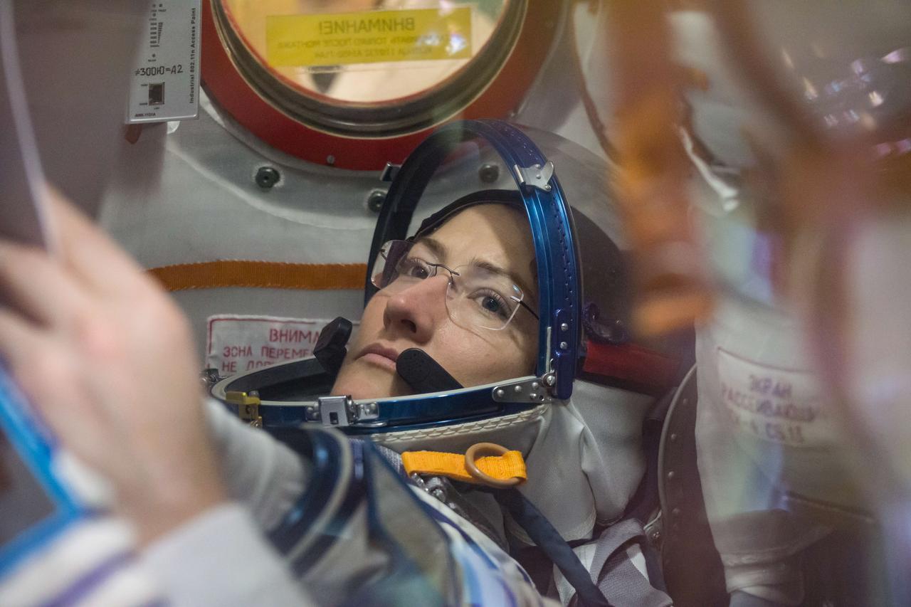 At the Baikonur Cosmodrome in Kazakhstan, Expedition 59 crewmember Christina Koch of NASA works inside the Soyuz MS-12 spacecraft Feb. 27 during pre-launch training. Koch, Alexey Ovchinin of Roscosmos and Nick Hague of NASA (right) will launch March 14, U.S. time, on the Soyuz MS-12 spacecraft from the Baikonur Cosmodrome in Kazakhstan for a six-and-a-half month mission on the International Space Station. NASA/Victor Zelentsov