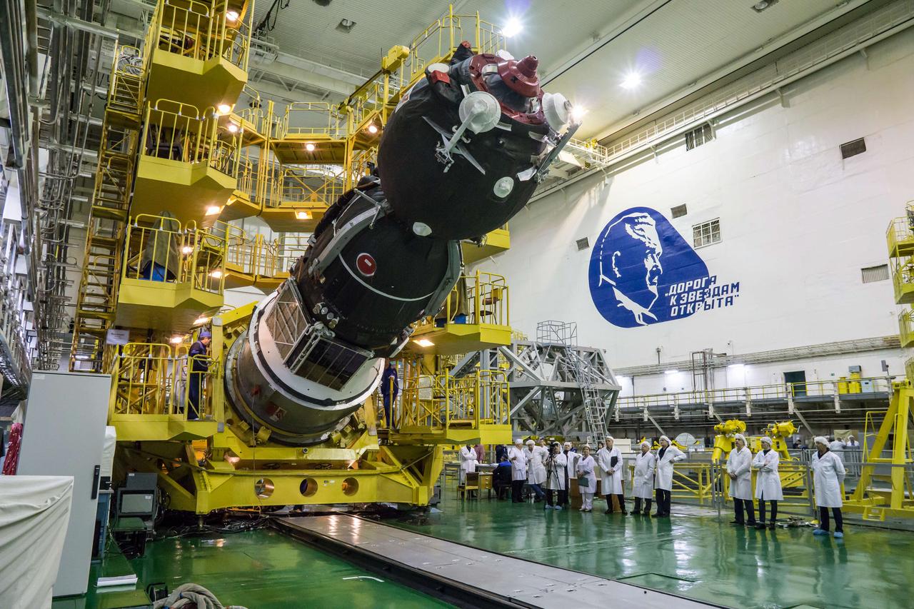 In the Integration Building at the Baikonur Cosmodrome in Kazakhstan, the Soyuz MS-12 spacecraft is lowered into position March 6 prior to its encapsulation into the nose fairing of the Soyuz booster rocket. Expedition 59 crewmembers Nick Hague and Christina Koch of NASA and Alexey Ovchinin of Roscosmos will launch on March 14, U.S. time, on the Soyuz MS-12 spacecraft from the Baikonur Cosmodrome for a six-and-a-half month mission on the International Space Station...NASA/Victor Zelentsov.