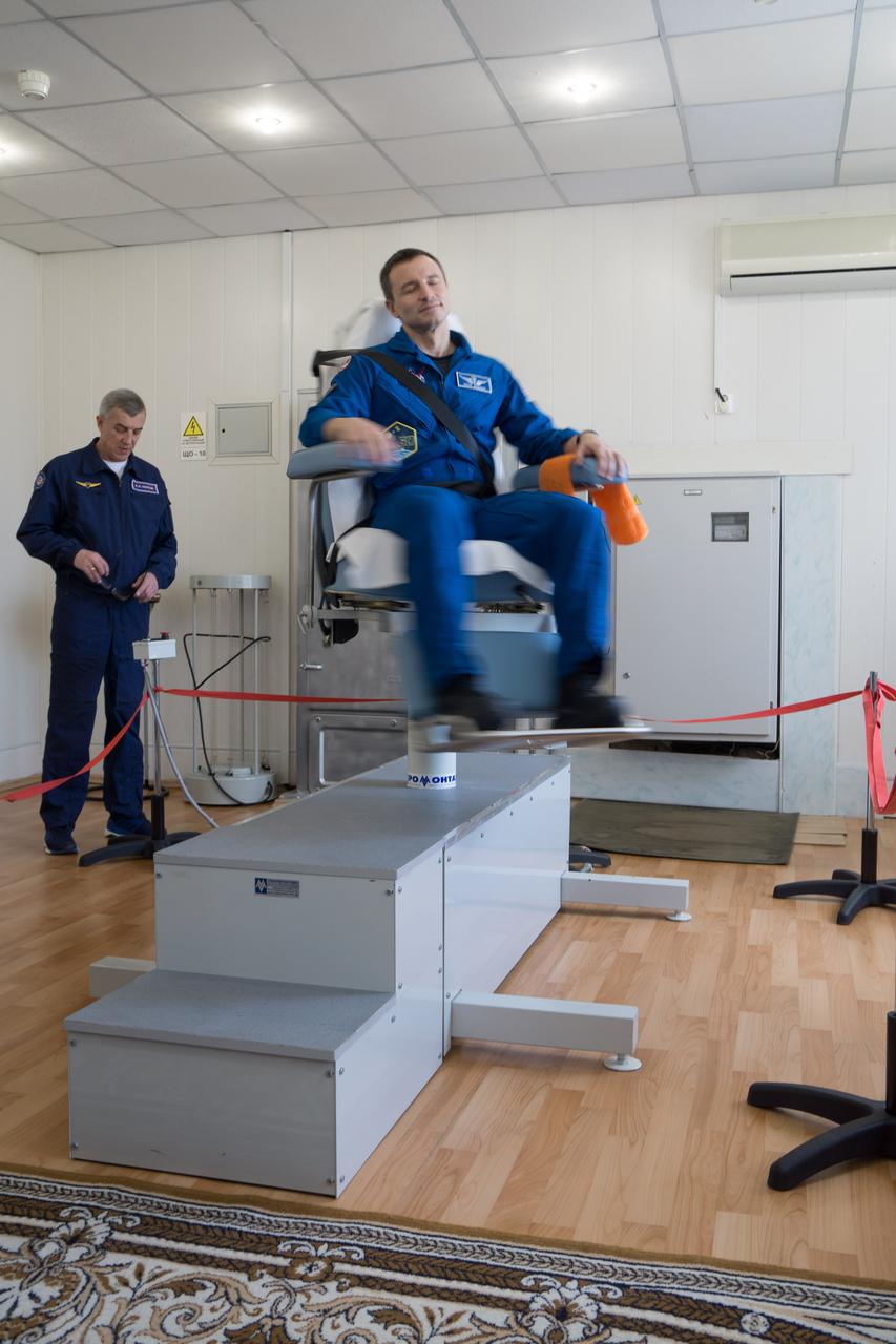 At the Cosmonaut Hotel crew quarters in Baikonur, Kazakhstan, Expedition 59 backup crewmember Drew Morgan of NASA tests his vestibular system in a rotating chair March 7 as part of his pre-launch activities. Morgan, Luca Parmitano of the European Space Agency and Alexander Skvortsov of Roscosmos are the backups to the prime crewmembers, Christina Koch of NASA, Alexey Ovchinin of Roscosmos and Nick Hague of NASA, who will launch March 14, U.S. time, on the Soyuz MS-12 spacecraft from the Baikonur Cosmodrome for a six-and-a-half month mission on the International Space Station...NASA/Victor Zelentsov.