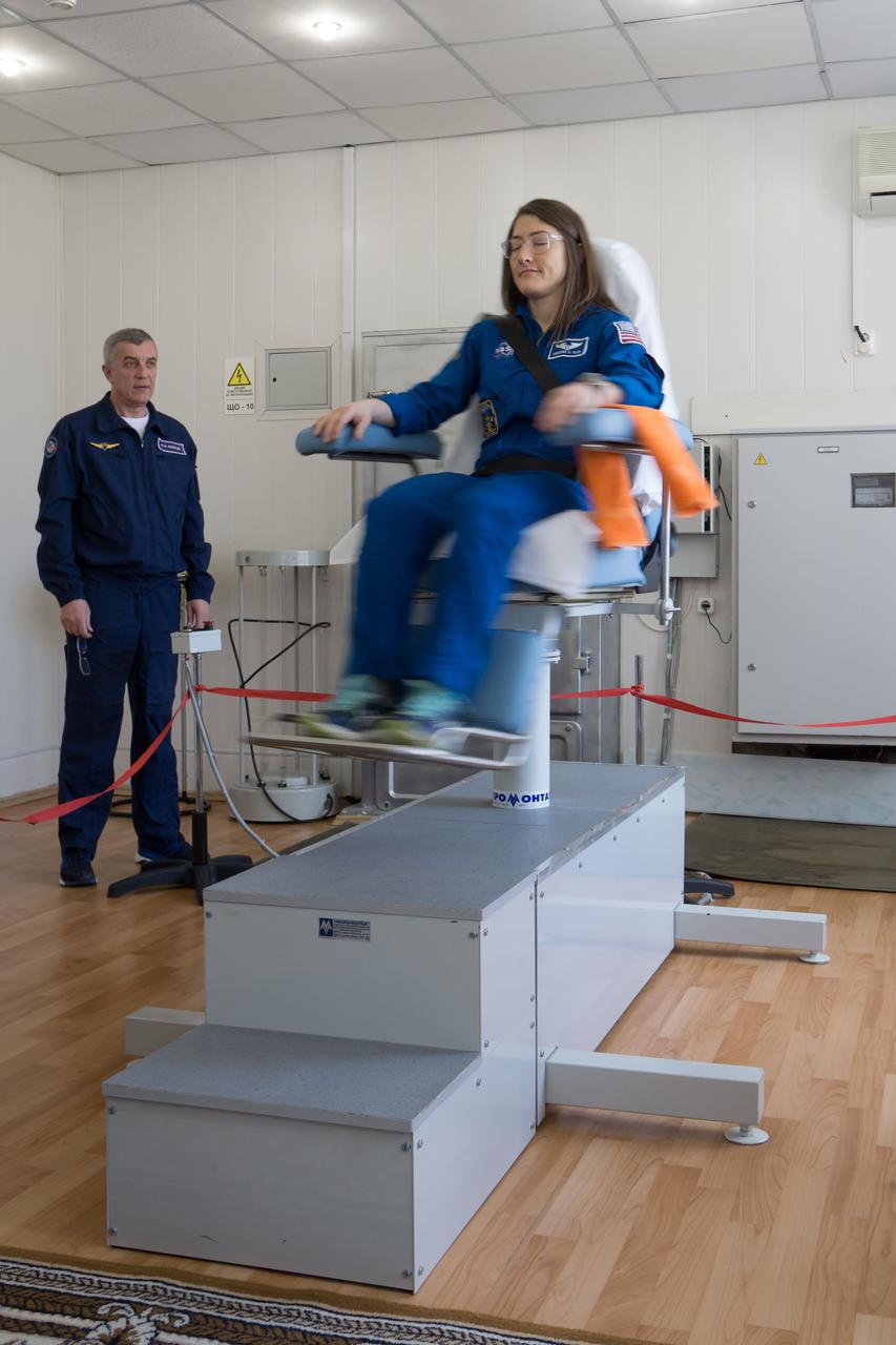 At the Cosmonaut Hotel crew quarters in Baikonur, Kazakhstan, Expedition 59 crewmember Christina Koch of NASA tests her vestibular system in a rotating chair March 7 as part of her pre-launch activities. Koch, Alexey Ovchinin of Roscosmos and Nick Hague of NASA will launch March 14, U.S. time, on the Soyuz MS-12 spacecraft from the Baikonur Cosmodrome for a six-and-a-half month mission on the International Space Station...NASA/Victor Zelentsov.