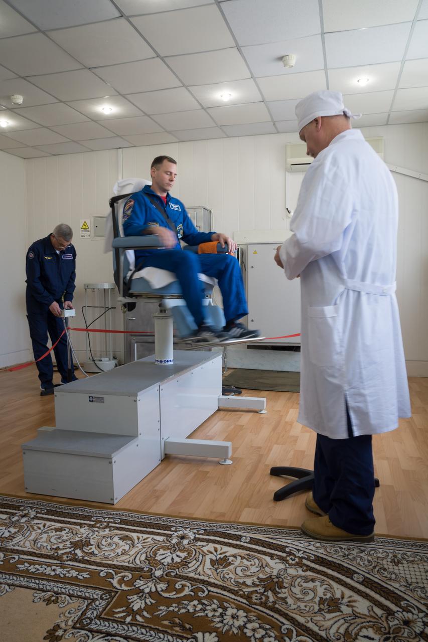 At the Cosmonaut Hotel crew quarters in Baikonur, Kazakhstan, Expedition 59 crewmember Nick Hague of NASA tests his vestibular system in a rotating chair March 7 as part of his pre-launch activities. Hague, Christina Koch of NASA and Alexey Ovchinin of Roscosmos will launch March 14, U.S. time, on the Soyuz MS-12 spacecraft from the Baikonur Cosmodrome for a six-and-a-half month mission on the International Space Station...NASA/Victor Zelentsov.