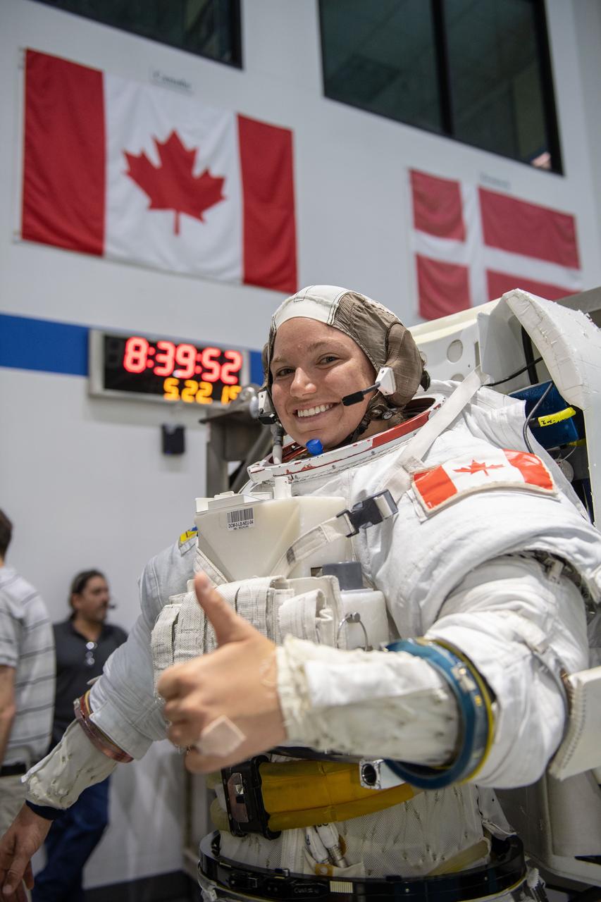 jsc2019e030018 (05-22-19) --- Canadian Space Agency astronaut candidate Jennifer Sidey-Gibbons in a spacesuit prior to underwater training at NASA Johnson Space Center’s Neutral Buoyancy Laboratory in Houston. Photo Credit: (NASA/David DeHoyos)