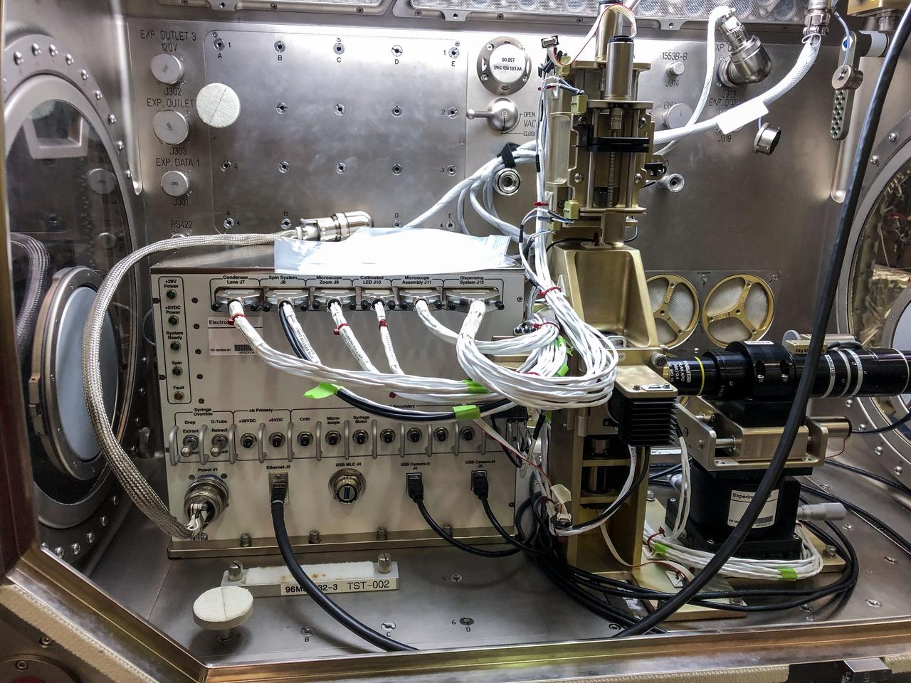 jsc2019e034530 (6/6/2019) --- Preflight photo documentation of the Ring Sheared Drop setup in the Microgravity Sciences Glovebox (MSG). The Ring Sheared Drop investigation uses microgravity to examine the formation and flow of amyloids in the absence of surface tension and other complications created by the solid walls of a container. Amyloids are associated with neurodegenerative diseases such as Alzheimer’s. This investigation may contribute to a better understanding of these diseases and development of potential treatments.