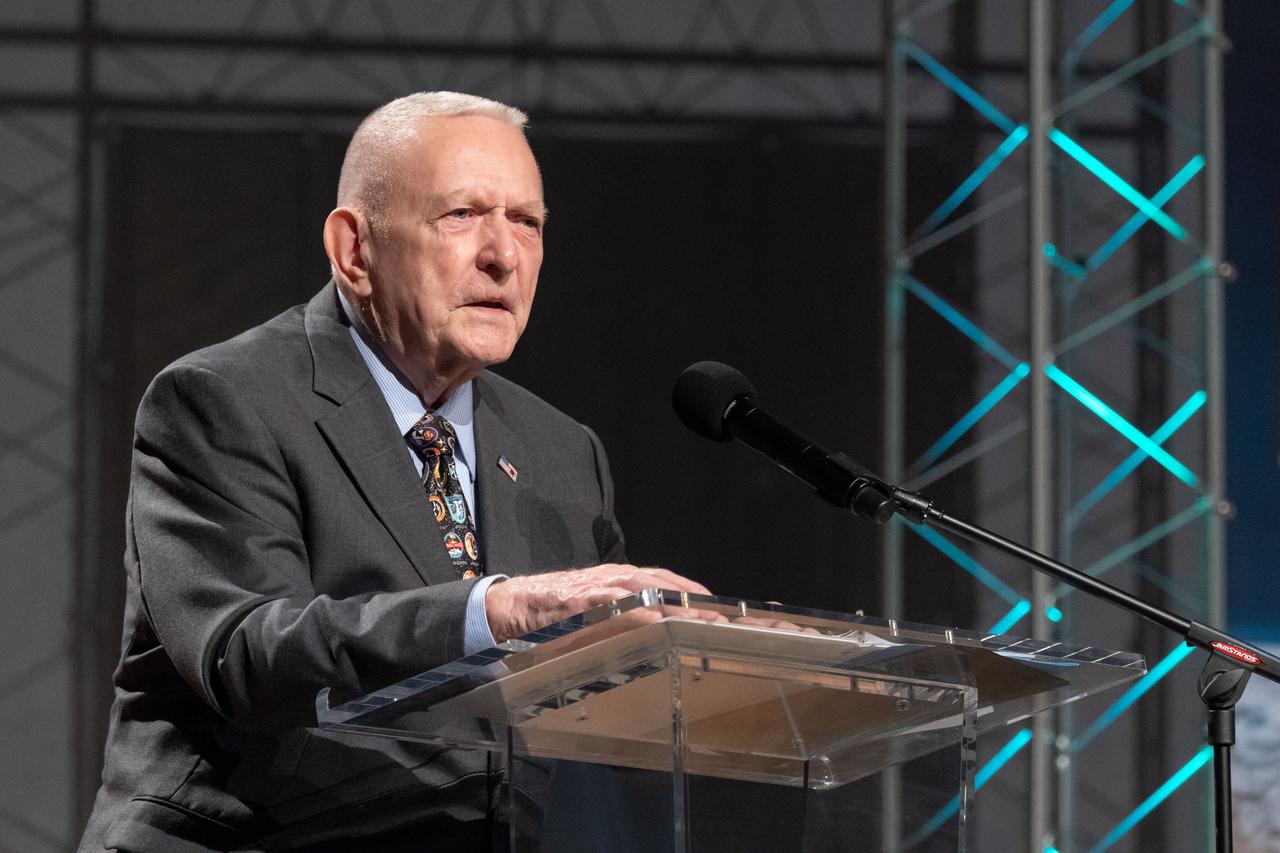 jsc2019e036695 (June 28, 2019) – Apollo 11 flight director Gene Kranz talks to grand opening visitors in NASA Johnson Space Center’s Teague Auditorium. NASA’s Johnson Space Center reopened the fully restored Apollo Mission Control Center with a grand opening and ribbon cutting event with NASA Administrator Jim Bridenstine on June 28. The room now is reconfigured to its Apollo-era condition. Many of the items in the restored room are original pieces from 1969 that were found or donated, and the missing items were replicated to ensure walking into the viewing room would feel like taking a step back in time. The restoration team used old photographs, footage, documents and interviews and discussions with Apollo veterans to set everything in its proper place, including coffee mugs, clothing articles and ashtrays. Beginning July 1, the Apollo Mission Control Center will become part of daily tours at Johnson hosted by Space Center Houston.