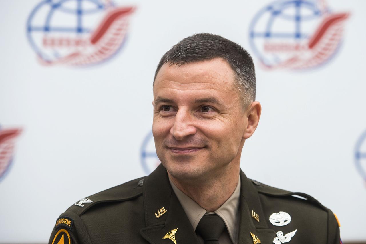 jsc2019e036811 - At the Gagarin Cosmonaut Training Center in Star City, Russia, Expedition 60 crewmember Drew Morgan of NASA listens to a reporter’s question June 29 during a news conference. Morgan, Alexander Skvortsov of Roscosmos and Luca Parmitano of the European Space Agency will launch July 20 on the Soyuz MS-13 spacecraft from the Baikonur Cosmodrome in Kazakhstan for a mission on the International Space Station...Andrey Shelepin/GCTC.