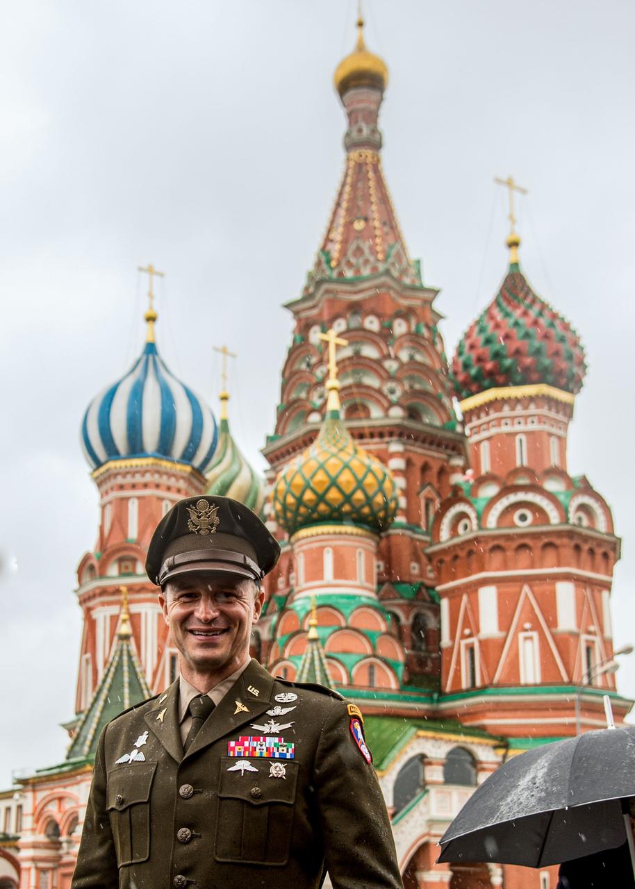 jsc2019e036815 - With St. Basil’s Cathedral in Moscow’s Red Square providing the backdrop, Expedition 60 crewmember Drew Morgan of NASA poses for pictures June 28 as part of traditional pre-launch activities. Morgan, Luca Parmitano of the European Space Agency and Alexander Skvortsov of Roscosmos will launch July 20 on the Soyuz MS-13 spacecraft from the Baikonur Cosmodrome in Kazakhstan for a mission on the International Space Station...NASA/Beth Weissinger..