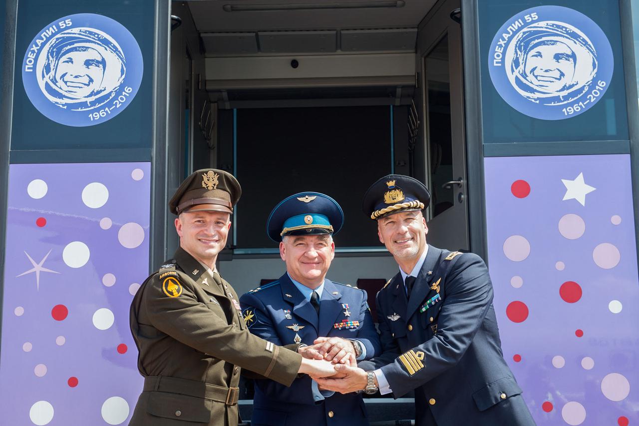 jsc2019e038369 - At the Baikonur Cosmodrome in Kazakhstan, Expedition 60 crewmembers Drew Morgan of NASA (left), Alexander Skvortsov of Roscosmos (center) and Luca Parmitano of the European Space Agency (right) pose for pictures July 4 after a flight from their training base outside Moscow for final pre-launch preparations. They will launch July 20 from the Baikonur Cosmodrome in Kazakhstan on the Soyuz MS-13 spacecraft for a mission on the International Space Station...Andrey Shelepin/GCTC.
