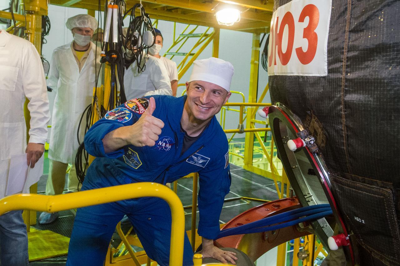 jsc2019e038385 - At the Baikonur Cosmodrome in Kazakhstan, Expedition 60 crewmember Drew Morgan of NASA flashes a thumbs up as he boards his Soyuz spacecraft July 5 for pre-launch preparations. Morgan, Luca Parmitano of the European Space Agency and Alexander Skvortsov of Roscosmos will launch July 20 on the Soyuz MS-13 spacecraft from the Baikonur Cosmodrome for a mission on the International Space Station...Andrey Shelepin/GCTC.