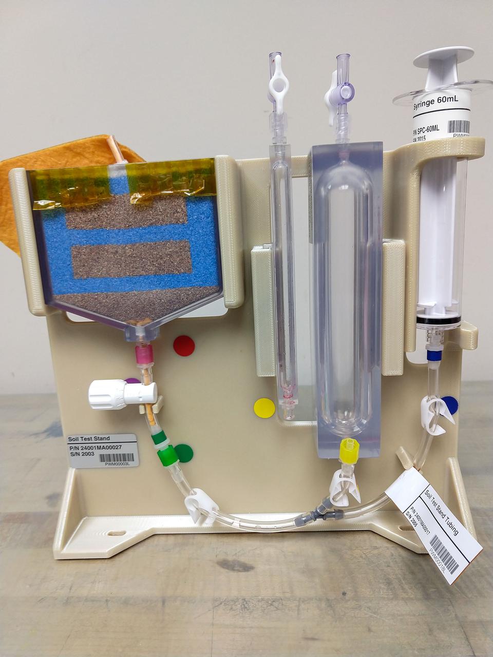 jsc2019e041774 (5/10/2019) --- Preflight imagery of a Plant Water Management (PWM) Harness and Hydroponics Test Article.  Plant Water Management demonstrates a hydroponic method for ensuring adequate hydration and aeration to the root zone in order to sustain plants from germination through harvest. Low-gravity capillary fluidics deliver water in single and multiple plant production chambers, and researchers compare growth of individual plants in microgravity and normal gravity.