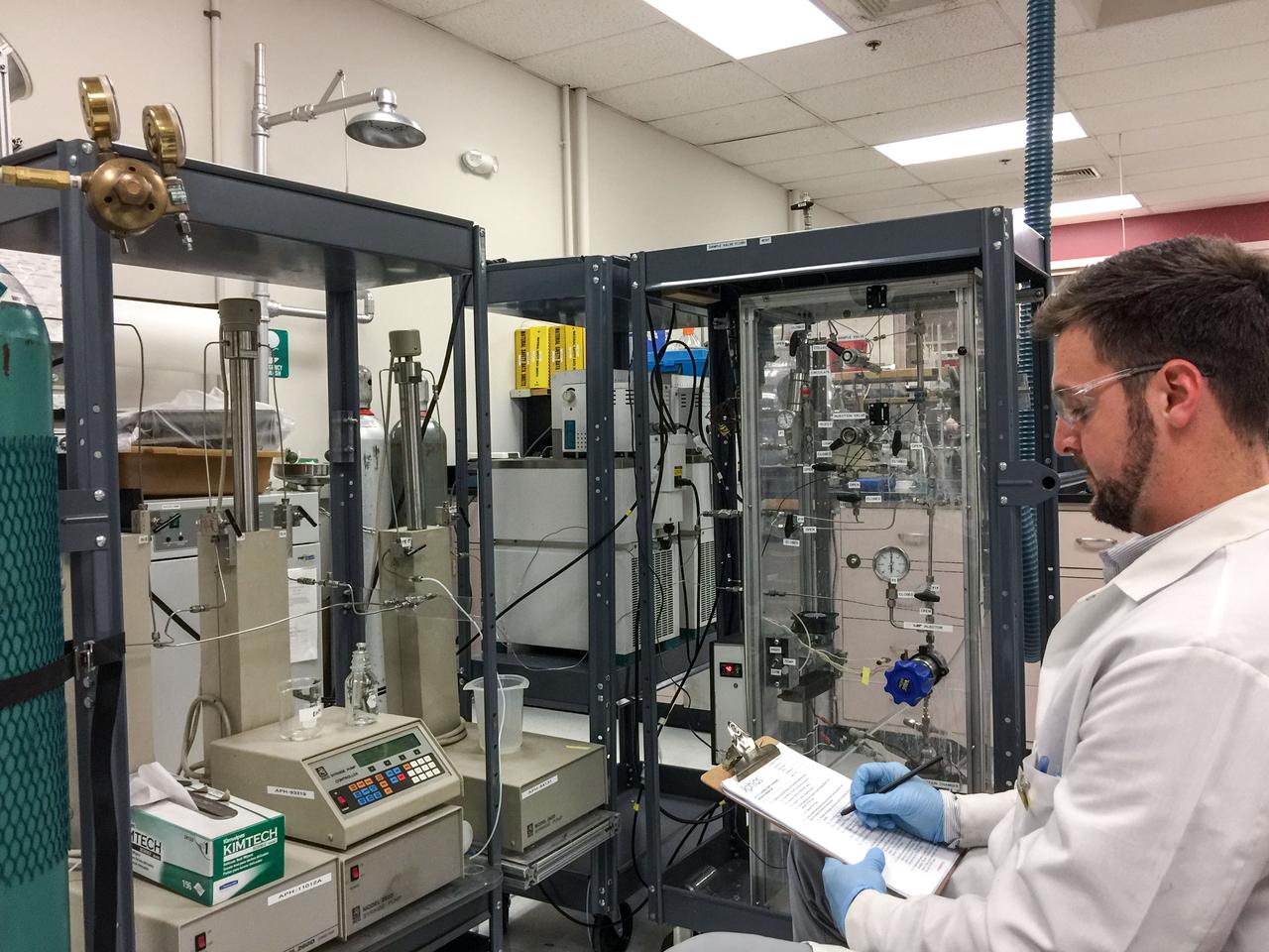 jsc2019e041783 (11/29/2016) --- A view of Mechanical Engineer, William Alexander Boatwright, writing Standard Operating Procedure for the SuperFluids Critical Fluid Nanosomes (SFS-CFN) Apparatus. The use of Precision Manufactured Targeted Nanoparticles for Orphan and Chronic Diseases like Alzheimer’s Disease in a Microgravity Environment Using Green SuperFluids Technology (STaARS BioScience-11) aims to create targeted nanoparticles that may arrest the progression of or cure Alzheimer’s Disease.