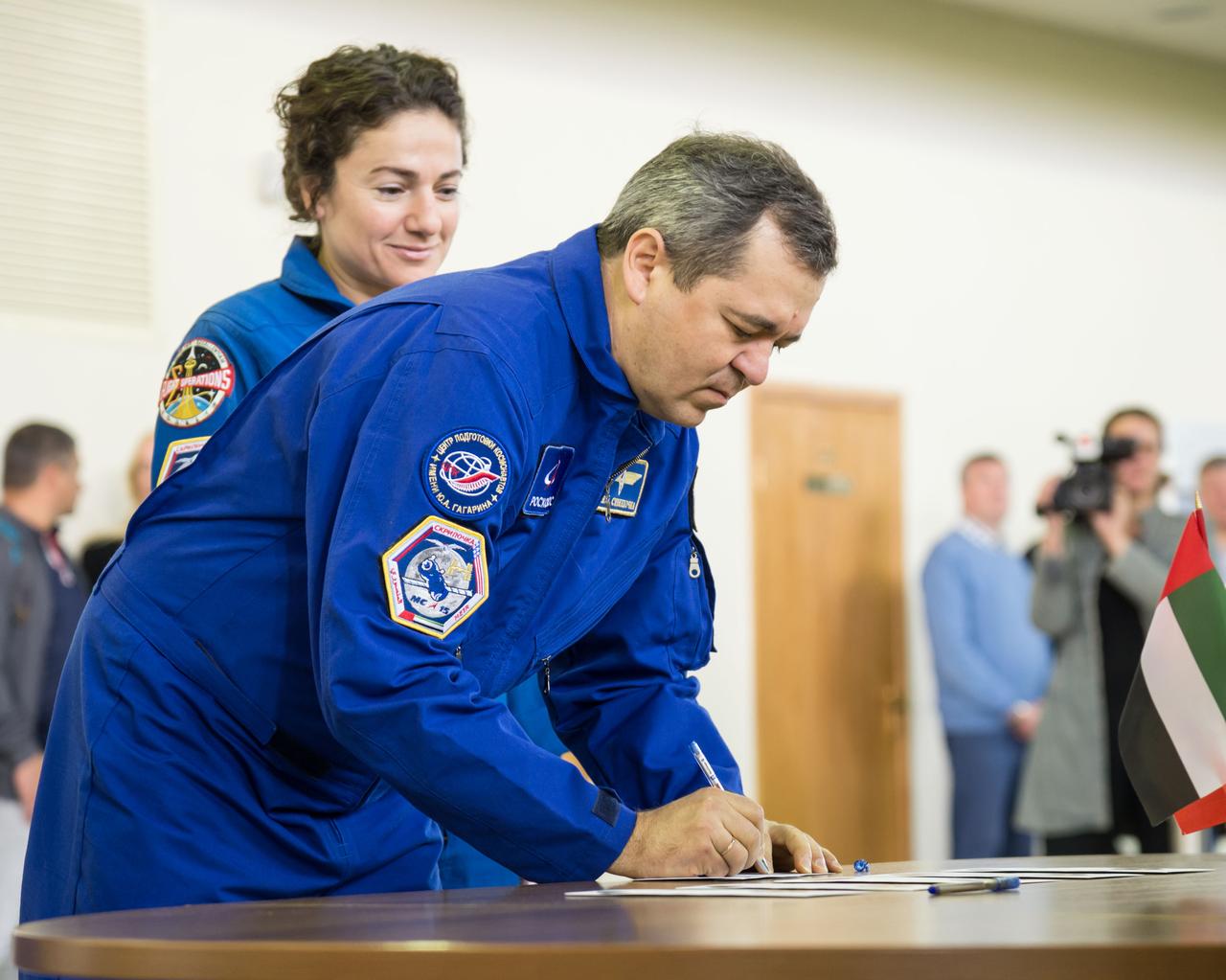 jsc2019e051813 - At the Gagarin Cosmonaut Training Center in Star City, Russia, Expedition 61 crewmember Oleg Skripochka of Roscosmos signs in for the first day of crew qualification exams Aug. 29. Skripochka, Jessica Meir of NASA and United Arab Emirates spaceflight participant Hazzaa Ali Almansoori will launch Sept. 25 from the Baikonur Cosmodrome in Kazakhstan on the Soyuz MS-15 spacecraft for a mission on the International Space Station...NASA/Beth Weissinger.