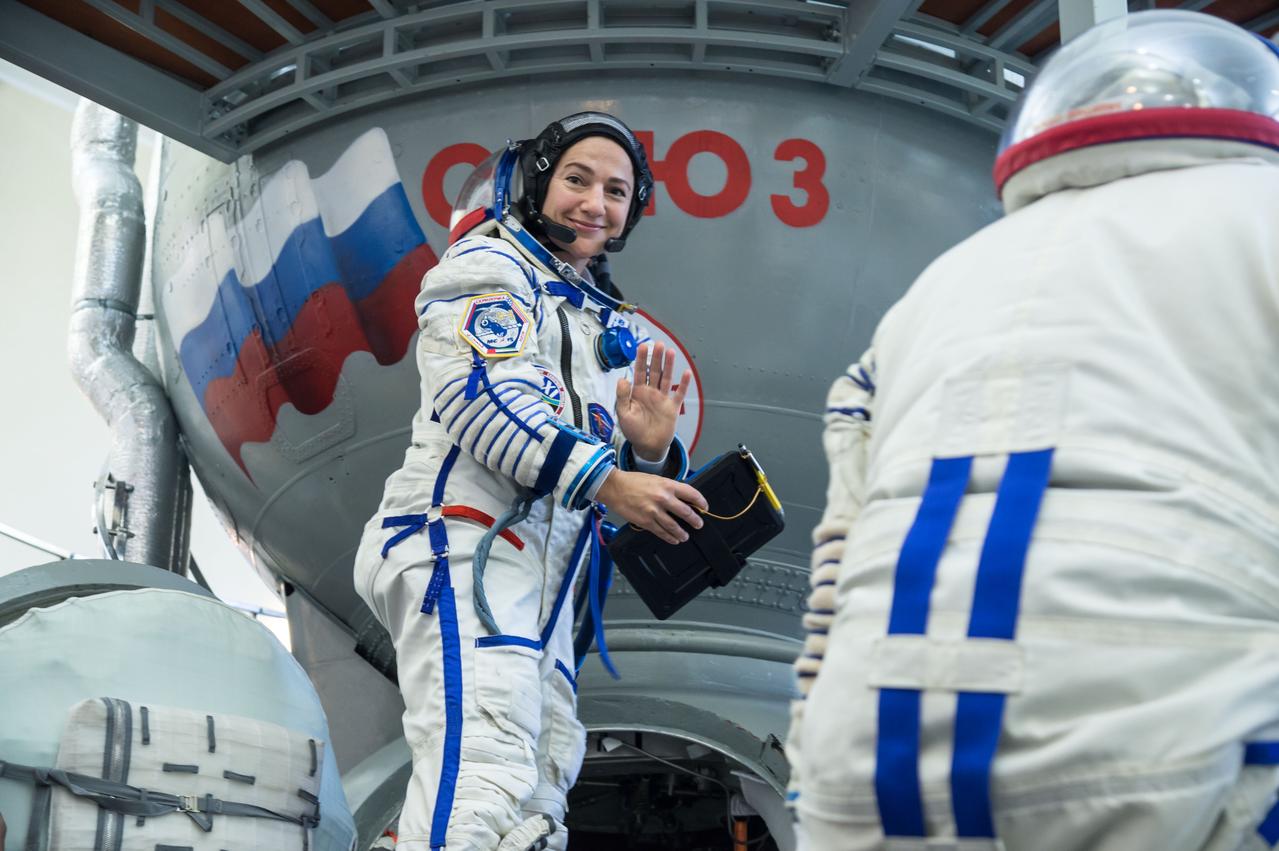 jsc2019e051848 - At the Gagarin Cosmonaut Training Center in Star City, Russia, Expedition 61 crewmember Jessica Meir of NASA climbs aboard a Soyuz trainer during final crew qualification exams Aug. 30. Meir will launch with Expedition 61 crewmember Oleg Skripochka of Roscosmos and spaceflight participant Hazzaa Ali Almansoori of the United Arab Emirates Sept. 25 on the Soyuz MS-15 spacecraft from the Baikonur Cosmodrome in Kazakhstan for a mission on the International Space Station...NASA/Beth Weissinger.