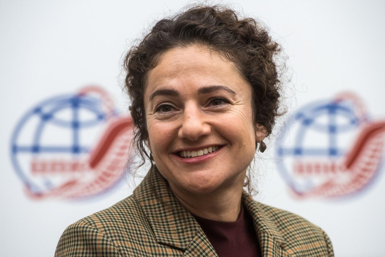 jsc2019e052147 - At the Gagarin Cosmonaut Training Center in Star City, Russia, Expedition 61 crewmember Jessica Meir of NASA listens to a reporter’s question Sept. 5 during a pre-launch news conference. Meir, Oleg Skripochka of Roscosmos and Hazzaa Ali Almansoori of the United Arab Emirates will launch Sept. 25 from the Baikonur Cosmodrome in Kazakhstan on the Soyuz MS-15 spacecraft for a mission on the International Space Station...Credit/Gagarin Cosmonaut Training Center.