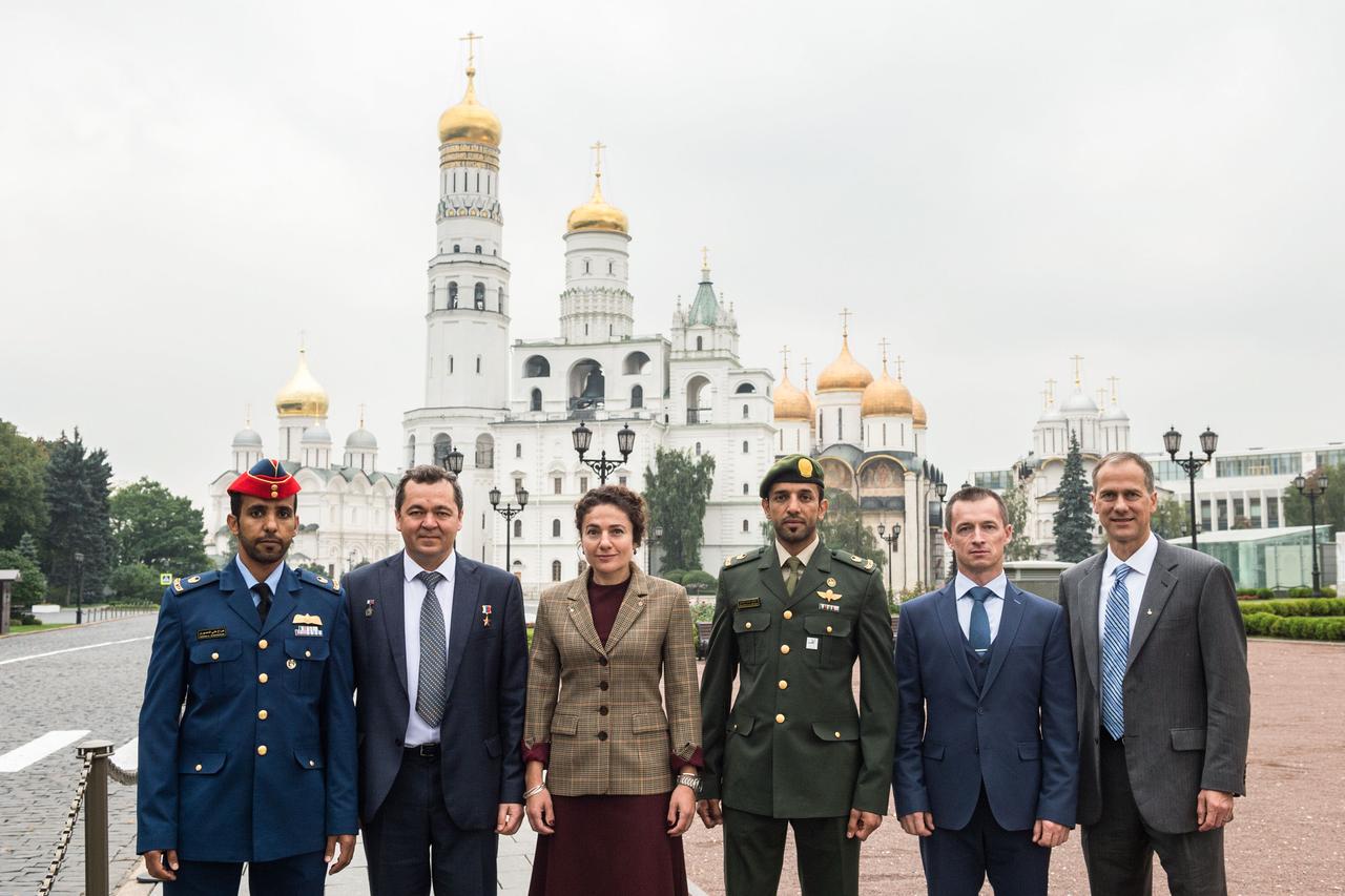 jsc2019e052237 - Inside the grounds of the Kremlin in Moscow, the prime and backup crewmembers for the next launch to the International Space Station pose for pictures Sept. 5 as part of pre-flight activities. From left to right are the prime crewmembers, spaceflight participant Hazzaa Ali Almansoori of the United Arab Emirates and Expedition 61 crewmembers Oleg Skripochka of Roscosmos and Jessica Meir of NASA, and their backups, Sultan Al-Neyadi of the United Arab Emirates, Sergey Ryzhikov of Roscosmos and Tom Marshburn of NASA. Meir, Skripochka and Almansoori will launch Sept. 25 from the Baikonur Cosmodrome in Kazakhstan on the Soyuz MS-15 spacecraft for a mission on the International Space Station...Andrey Shelepin/Gagarin Cosmonaut Training Center.