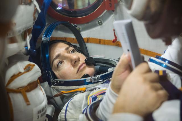 NASA image: jsc2019e052894 - In the Integration Building at the Baikonur Cosmodrome in Kazakhstan, Expedition 61 crewmember Jessica Meir of NASA runs through procedures Sept. 11 aboard the Soyuz MS-15 spacecraft during an initial Soyuz vehicle fit check. Meir, spacef