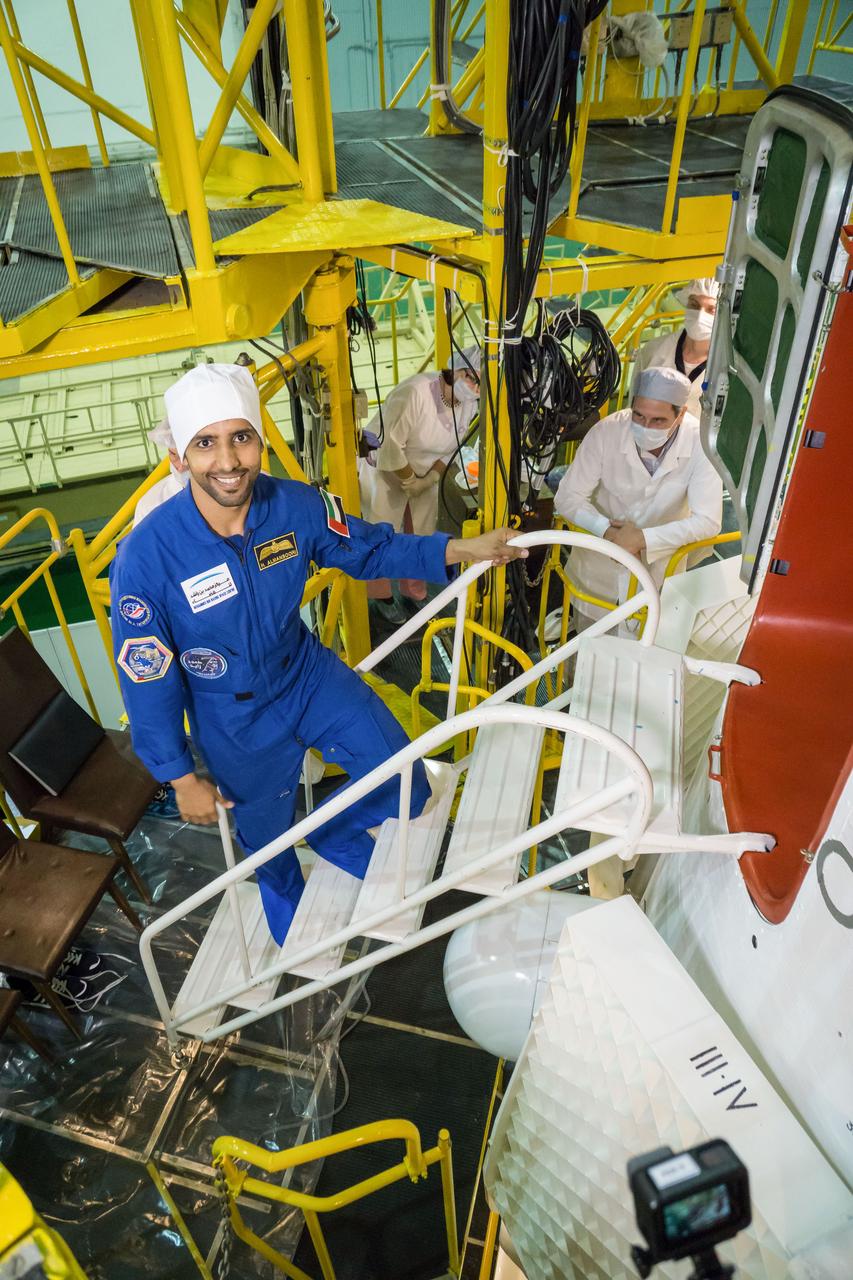 jsc2019e053738 - At the Baikonur Cosmodrome in Kazakhstan, spaceflight participant Hazzaa Ali Almansoori of the United Arab Emirates poses for pictures Sept. 20 before inspecting the Soyuz MS-15 spacecraft during final fit check activities. Almansoori and Expedition 61 crewmembers Oleg Skripochka of Roscosmos and Jessica Meir of NASA will launch Sept. 25 on the Soyuz MS-15 spacecraft for a mission on the International Space Station...NASA/Victor Zelentsov