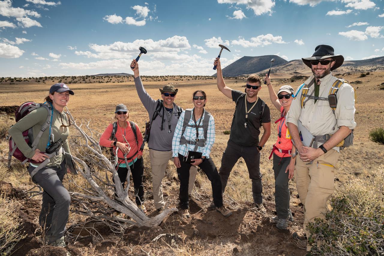 jsc2019e055210 (09-18-19) --- 2017 NASA astronaut candidates take a break with their field instructors during geology training in Arizona. Photo Credit: (NASA/Bill Stafford)