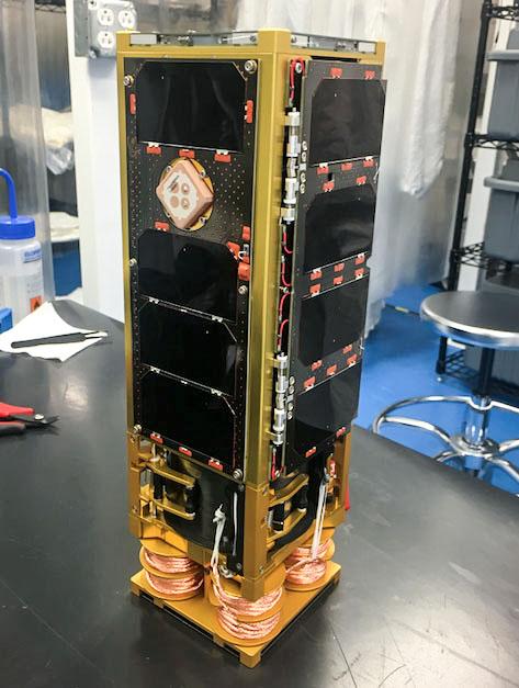 jsc2019e056548 (9/27/2019) --- Preflight overall view of SwampSat-II . SwampSat II measures very low frequency (VLF) wave propagation in Earth’s upper atmosphere using a novel antenna that has higher sensitivity than existing methods. The antenna system, developed by students at the University of Florida, launches in a 3-Unit CubeSat. Ground-based sources such as VLF transmitters and lightning injected VLF waves into the upper atmosphere, and measuring these waves is essential to understanding loss of energetic radiation belt particles. Image courtesy of: The SwampSat Team at University of Florida