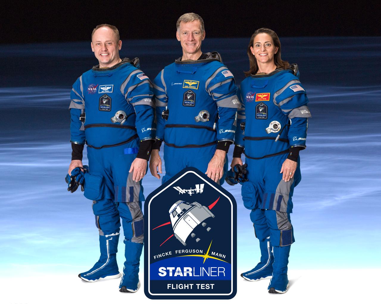 From left to right, NASA astronaut Mike Fincke, Boeing astronaut Chris Ferguson, and NASA astronaut Nicole Mann pose for the official crew portrait for Boeing’s Crew Flight Test to the International Space Station, part of NASA’s Commercial Crew Program.