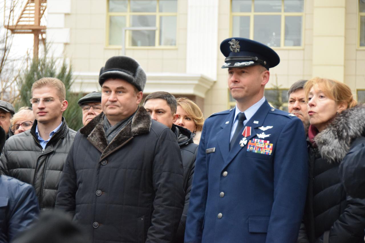 jsc2019e067106 - Outside the headquarters of the Russian space agency Roscosmos in Moscow, NASA astronaut Nick Hague (second from right) attends a ceremony Dec. 2 in which he received the medal of the Order of Courage from the head of Roscosmos, Dmitri Rogozin. The awarding of the medal to Hague who was joined by crewmate and Russian cosmonaut Alexey Ovchinin accompanied the unveiling of the Soyuz spacecraft in front of Roscosmos’ headquarters building in which Hague and Ovchinin launched on Oct. 11, 2018 on an aborted mission to the International Space Station. About two minutes after launch, a booster separation problem triggered a launch abort, resulting in Hague and Ovchinin flying free of their Soyuz booster and landing safely in their Soyuz capsule downrange on the steppe of Kazakhstan. Hague and Ovchinin were reassigned to fly again, launching on March 15, 2019 for a mission that spanned 203 days in space...Credit: Roscosmos                .