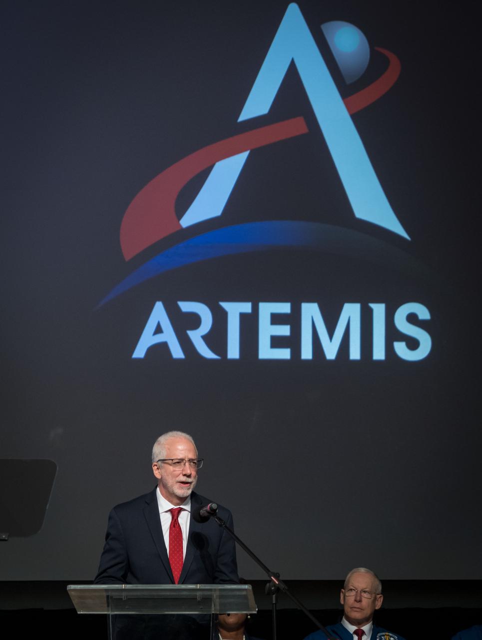 jsc2020e000600 (Jan. 10, 2020) --- Johnson Space Center Director Mark Geyer addresses visitors attending the graduation of the 2017 Class of Astronauts in Houston, Texas.   This is the first class of astronauts to graduate under the Artemis program and are now eligible for assignments to the International Space Station, Artemis missions to the Moon, and ultimately, missions to Mars.