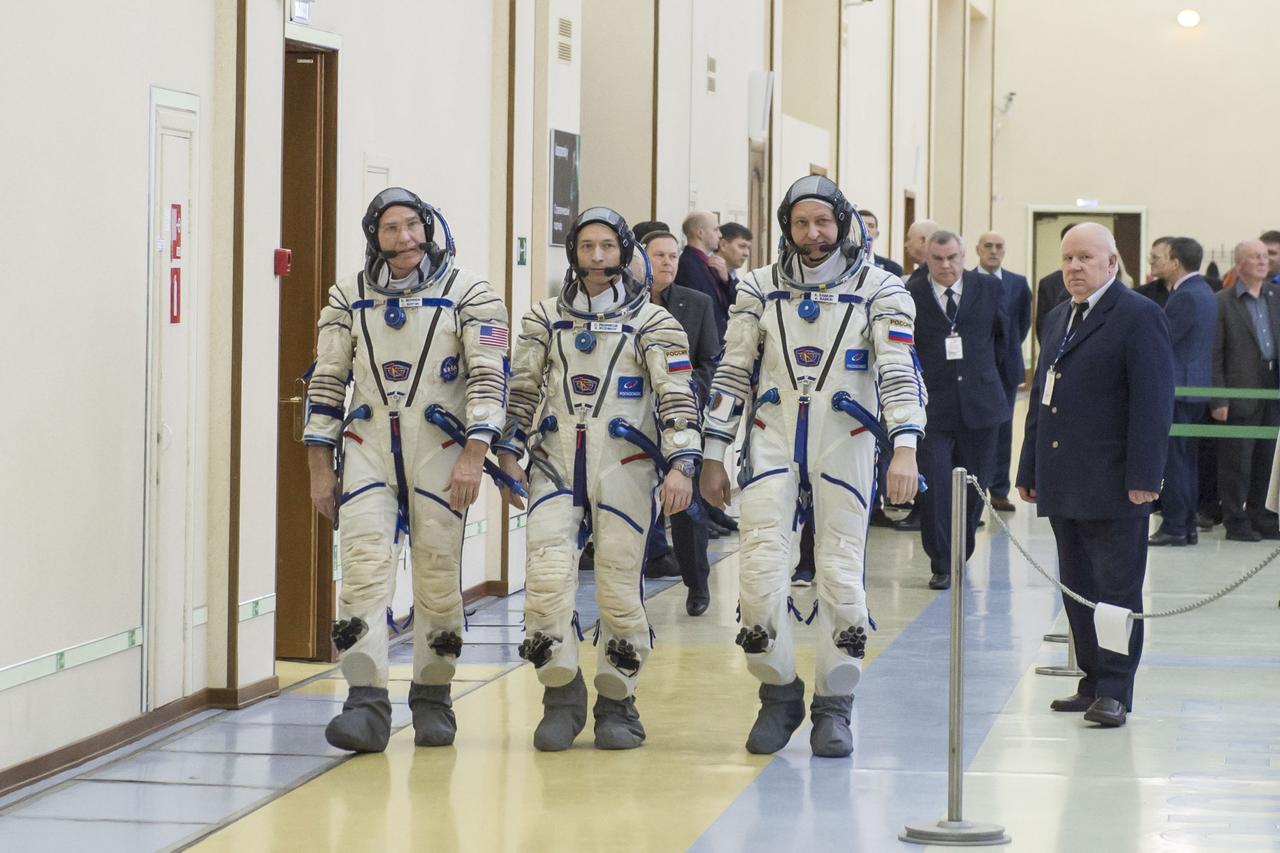 jsc2020e016217 - At the Gagarin Cosmonaut Training Center in Star City, Russia, Expedition 63 backup crewmembers Steve Bowen of NASA (left) and Sergey Ryzhikov (center) and Andrei Babkin of Roscosmos (right) arrive for Soyuz qualification exams March 11. They are the backups to Chris Cassidy of NASA and Anatoly Ivanishin and Ivan Vagner of Roscosmos, who are scheduled to launch April 9 in the Soyuz MS-16 spacecraft from the Baikonur Cosmodrome in Kazakhstan for a six-and-a-half month mission on the International Space Station...Andrey Shelepin/Gagarin Cosmonaut Training Center.