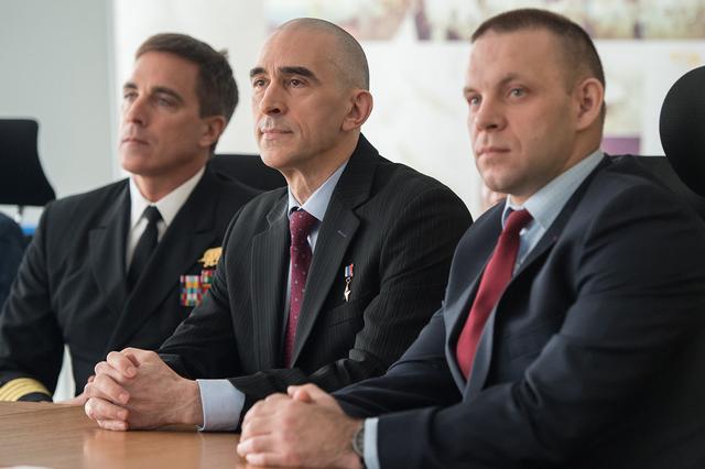 jsc2020e016783 - At the Gagarin Cosmonaut Training Center in Star City, Russia, Expedition 63 crewmembers Chris Cassidy of NASA (left) and Anatoly Ivanishin (center) and Ivan Vagner of Roscosmos (right) listen as the Russian State Commission approves them for launch March 23 on the eve of their departure for their launch site at the Baikonur Cosmodrome in Kazakhstan. Cassidy, Ivanishin and Vagner will launch April 9 on the Soyuz MS-16 spacecraft from Baikonur for a six-and-a-half month mission on the International Space Station...Andrey Shelepin/Gagarin Cosmonaut Training Center.