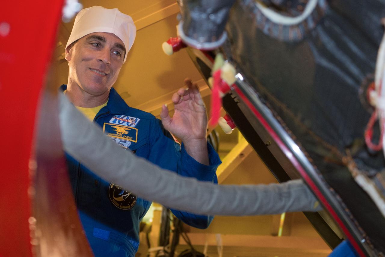 jsc2020e016843 - At the Baikonur Cosmodrome in Kazakhstan, Expedition 63 crewmember Chris Cassidy of NASA prepares to enter the Soyuz MS-16 spacecraft March 25 as part of pre-launch training activities. Cassidy and Anatoly Ivanishin and Ivan Vagner of Roscosmos will launch April 9 on the Soyuz from Baikonur for a six-and-a-half month mission on the International Space Station...Andrey Shelepin/Gagarin Cosmonaut Training Center.