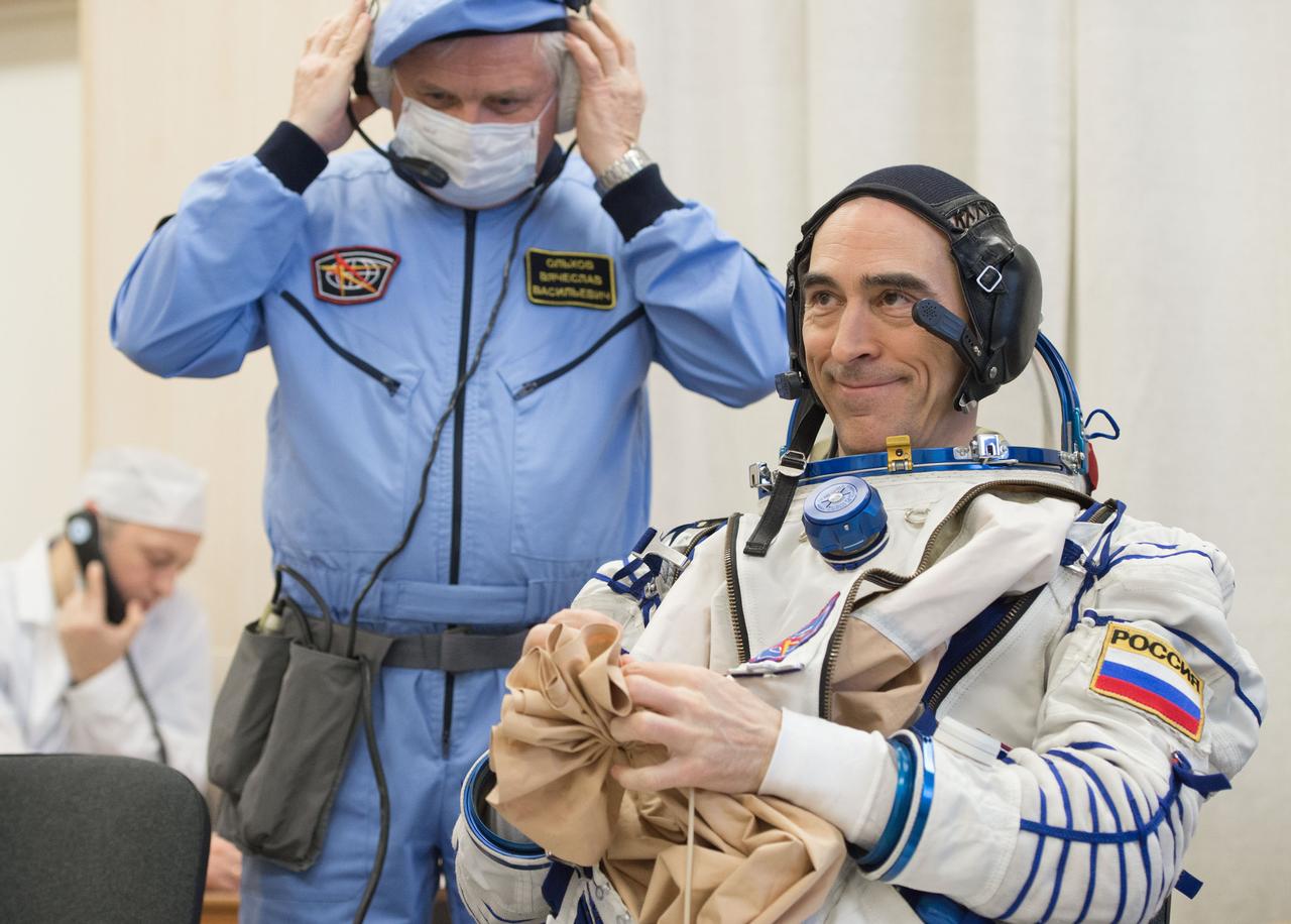 jsc2020e016850 - At the Baikonur Cosmodrome in Kazakhstan, Expedition 63 crewmember Anatoly Ivanishin of Roscosmos suits up March 25 for pre-launch training activities. Ivanishin, Ivan Vagner of Roscosmos and Chris Cassidy of NASA will launch April 9 on the Soyuz MS-16 spacecraft from Baikonur for a six-and-a-half month mission on the International Space Station...Andrey Shelepin/Gagarin Cosmonaut Training Center..