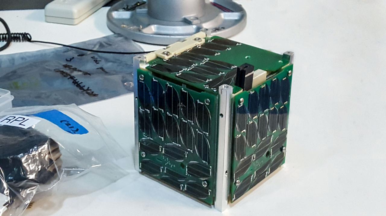 jsc2020e016860 (8/5/2016) --- A view of the fully assembled prototype of Alpha CubeSat. Alpha comprises a 1U CubeSat capable of deploying a free-flying 1m x 1m light sail equipped with 4 chip satellites (ChipSats). The overall goal of the Alpha mission is to serve as a technical demonstration of a light sail in orbit, verifying the properties of a highly retroreflective material for laser propulsion. Image courtesy of Cornell SSDS.