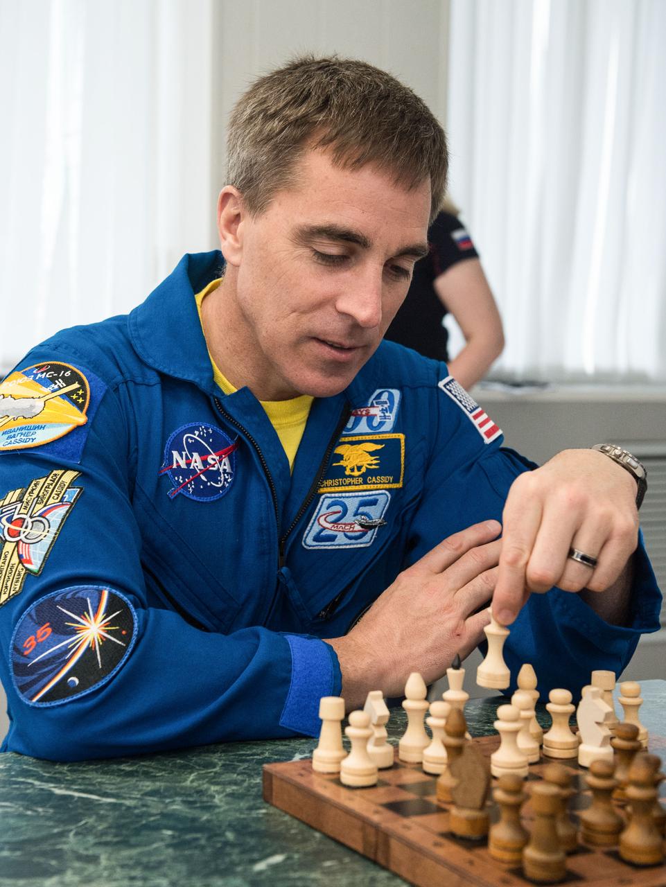 jsc2020e016961 - At the Cosmonaut Hotel crew quarters in Baikonur, Kazakhstan, Expedition 63 crewmember Chris Cassidy of NASA plays a game of chess April 1. Cassidy and Ivan Vagner and Anatoly Ivanishin of Roscosmos will launch April 9 on the Soyuz MS-16 spacecraft from the Baikonur Cosmodrome in Kazakhstan for a six-and-a-half month mission on the International Space Station...Andrey Shelepin/Gagarin Cosmonaut Training Center.