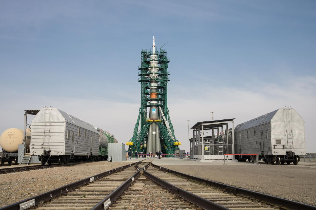 jsc2020e016998 - At the Baikonur Cosmodrome in Kazakhstan, the Soyuz MS-16 spacecraft and its booster stand at their vertical position at the Site 31 launch pad April 6 after the closing of gantry arms following rollout for final preparations for launch. Expedition 63 crewmembers Chris Cassidy of NASA and Anatoly Ivanishin and Ivan Vagner of Roscosmos are set to launch aboard the Soyuz MS-16 April 9 for a six-and-a-half month mission on the International Space Station...NASA/Victor Zelentsov.