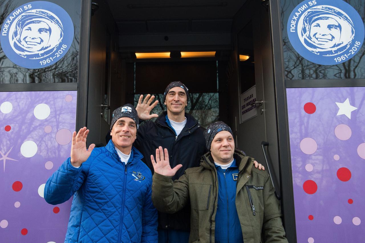 jsc2020e017066 - Expedition 63 Preflight - Expedition 63 crewmembers Chris Cassidy of NASA, left, and Anatoly Ivanishin, center, and Ivan Vagner of Roscosmos leave their Cosmonaut Hotel crew quarters in Baikonur, Kazakhstan to travel to their suit up facility for launch on the Soyuz MS-16 rocket from the Baikonur Cosmodrome, Thursday, April 9, 2020. They are beginning a six-and-a-half month mission on the International Space Station.Photo Credit: (NASA/GCTC/Andrey Shelepin)